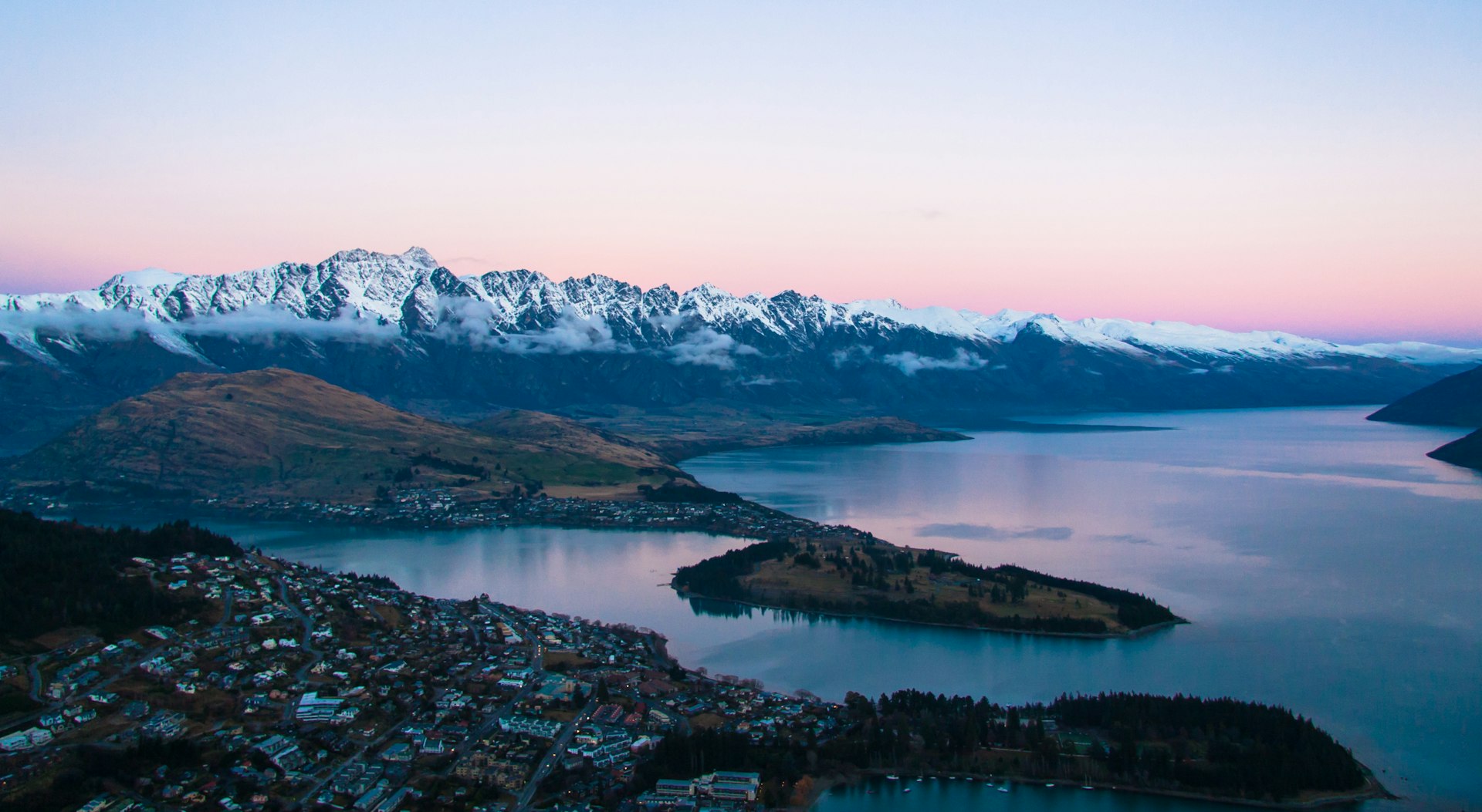 Sunset over Queenstown — the same view at three very different nightly rates